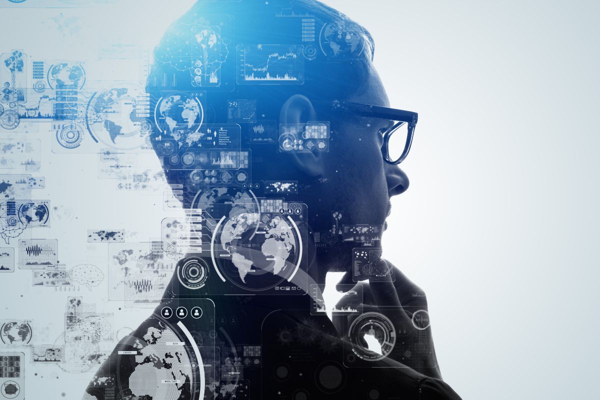 The image shows a visual graphic and a man thinking indicating that artificial intelligence engineer building smart systems is one of the high-paying tech jobs.