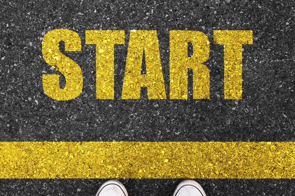 The photo is about a start word on the road.