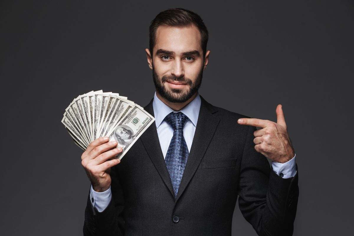 The photo shows a man making $200k a year.