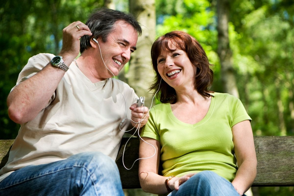 The image shows an early retirement couple.