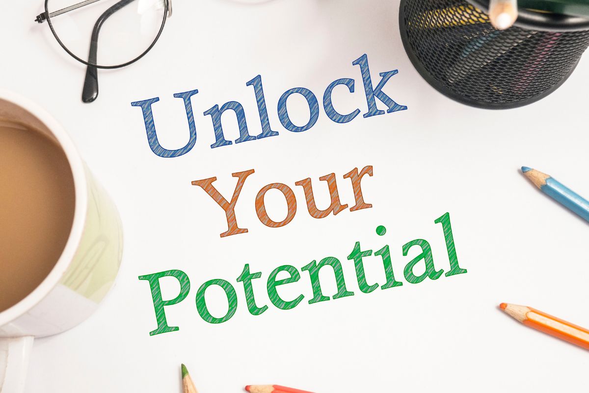 The photo shows a coffee, an eyeglass, a pen, and notes on the white paper indicating to pick your favorite millionaire quotes that can help anyone create a stronger financial future.