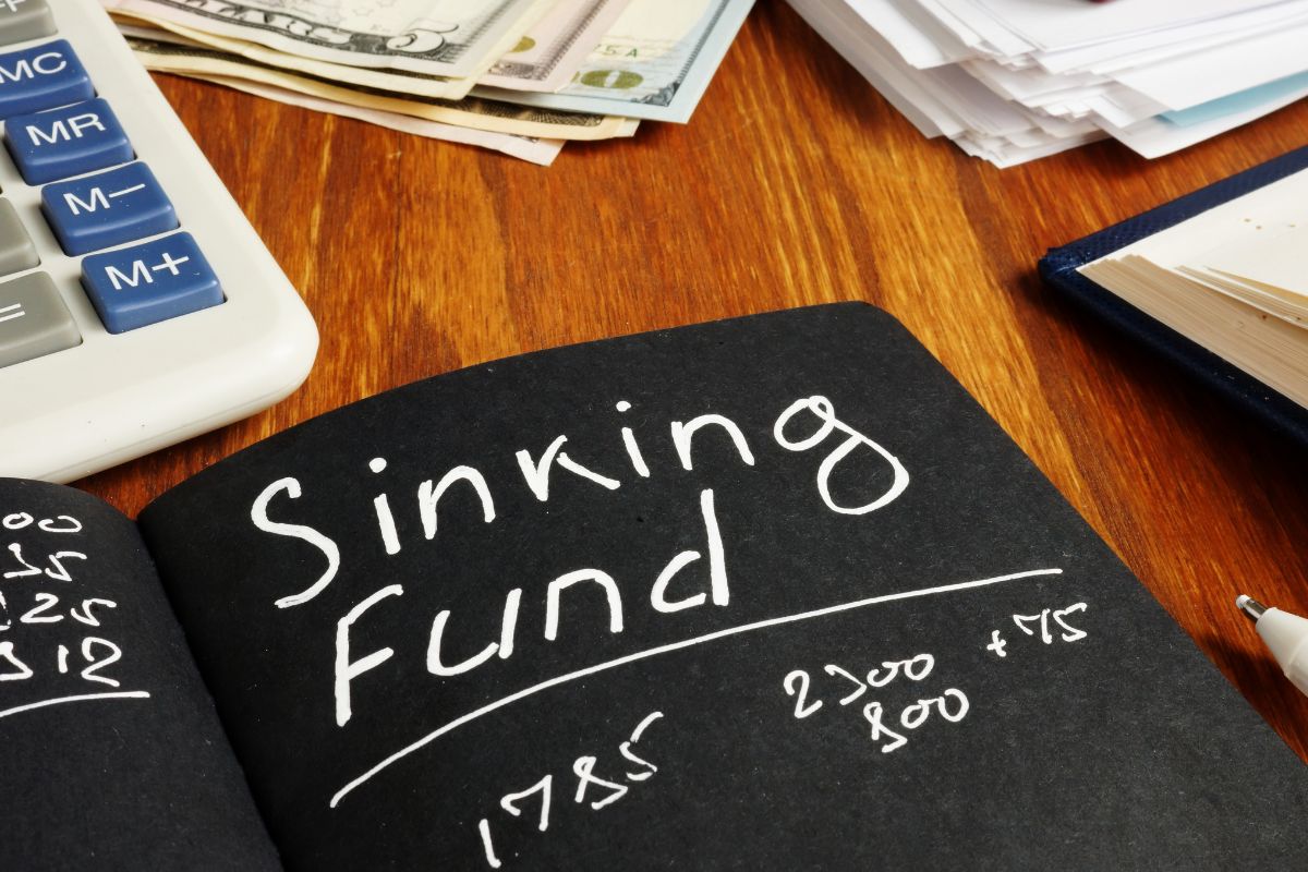 The image is about a black paper with sinking fund wording.