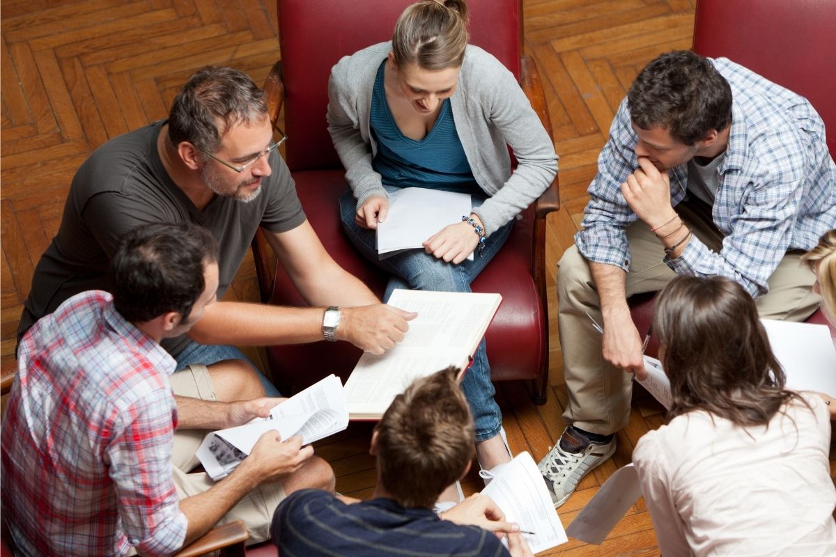 The photo shows a group of friends gathering.