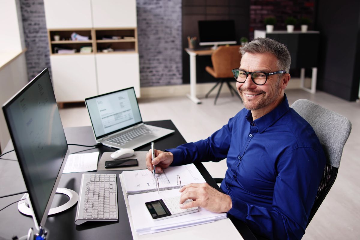 The image of a man working as a bookkeeper.