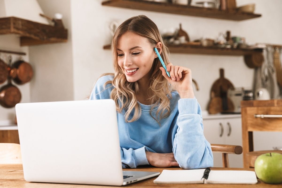The photo shows a woman selling products online.