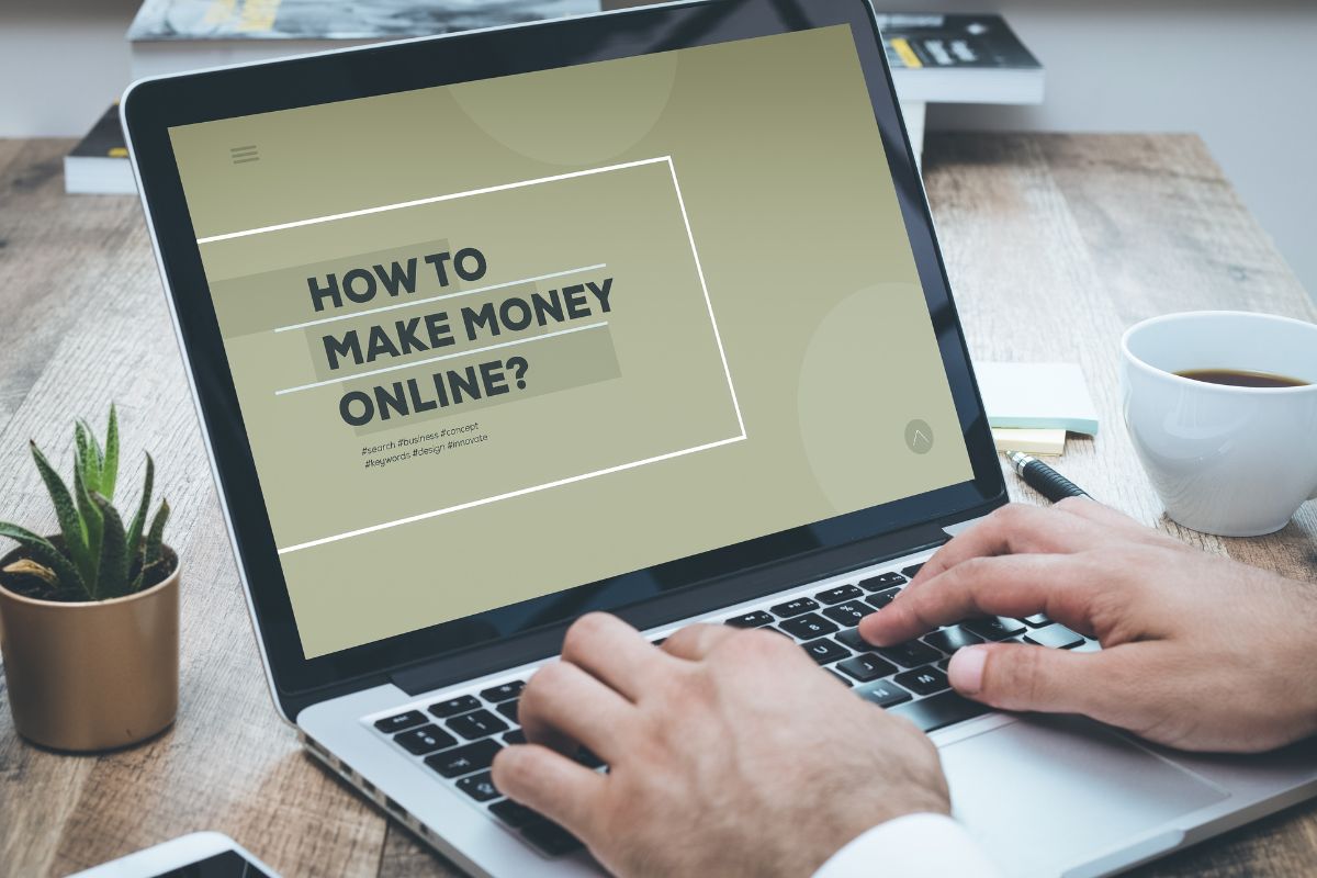 The image is about a man's hand making money online.