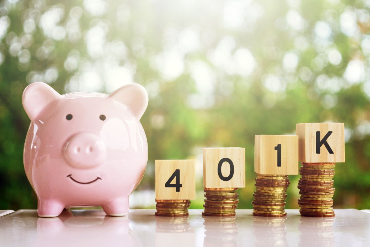 The photo is about a piggy bank and 401K wording.