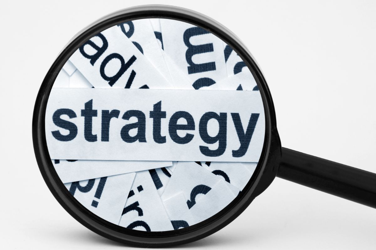 The image shows a paper with strategy wording.