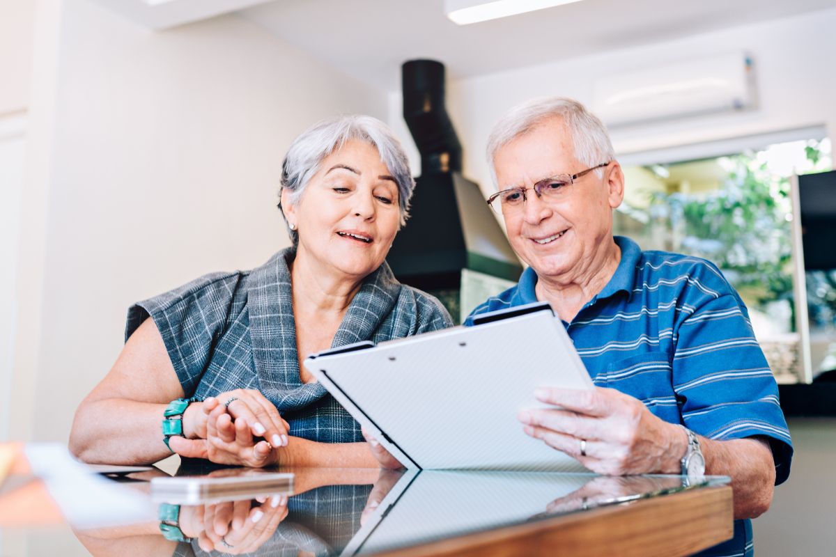 The photo shows seniors taking care of documents before death.