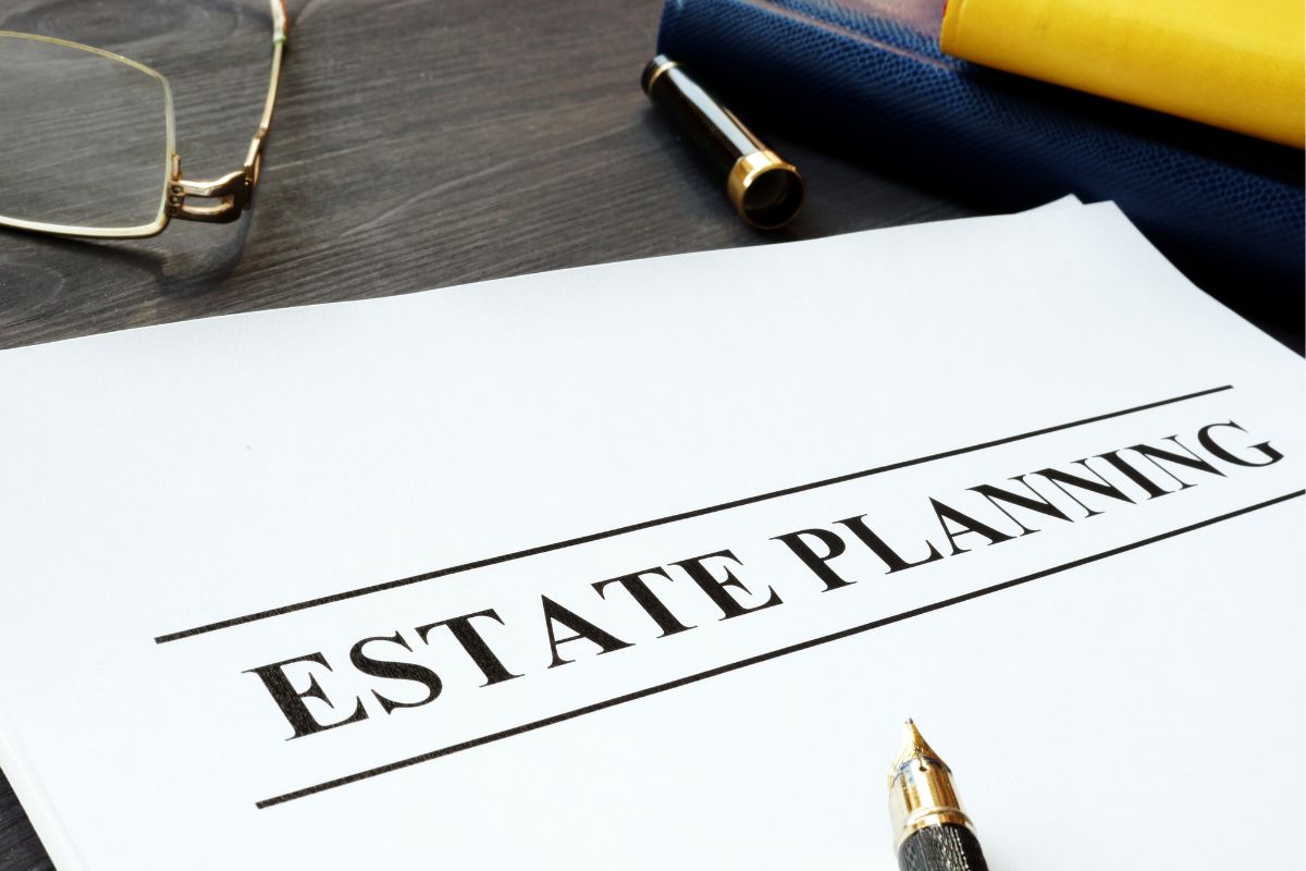 The photo shows a paper with estate planning text.
