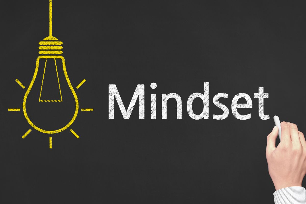 The image shows a board with mindset wording.