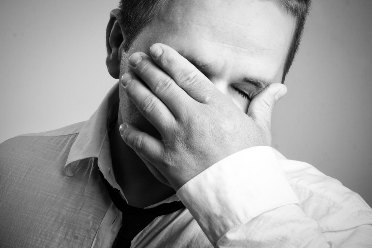 The picture shows a man with financial regret.