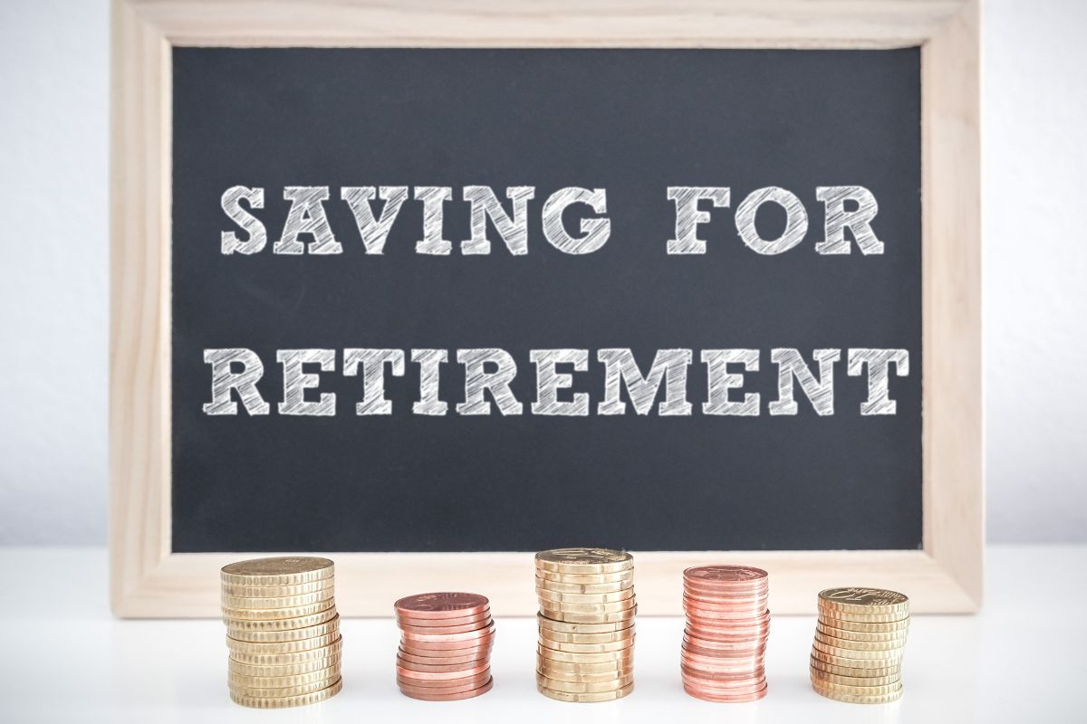 The picture shows coins and a board with savings for retirement.