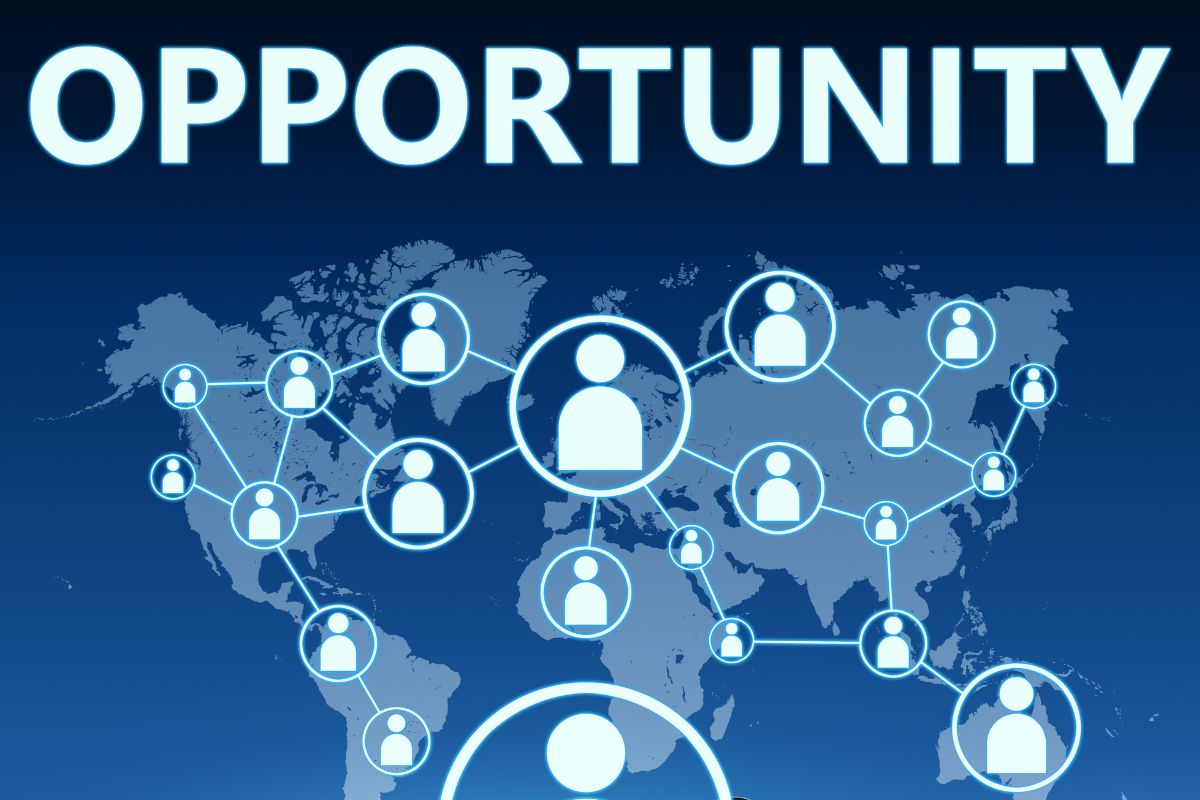 The photo shows people connected with the opportunity wording.