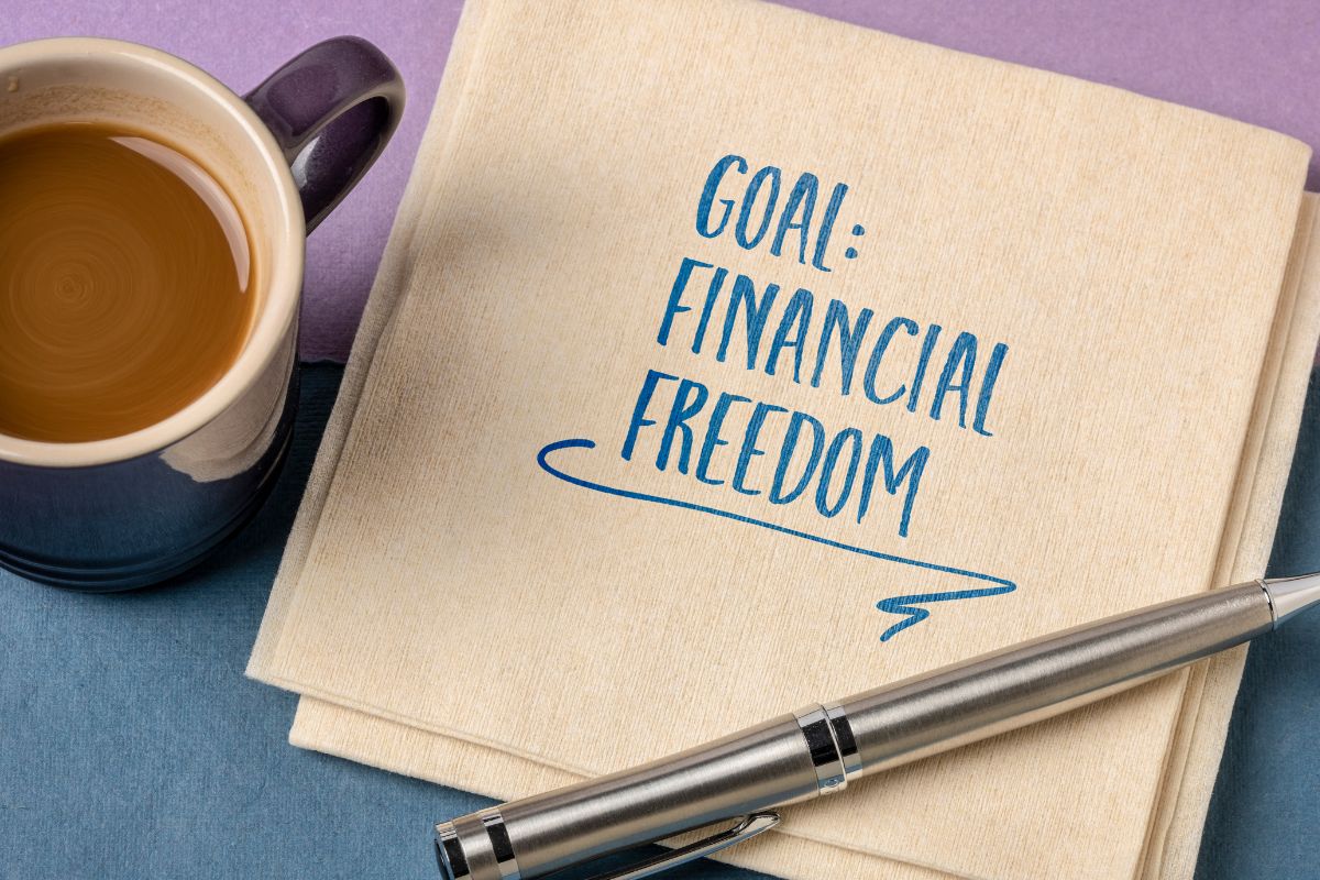 The image shows a coffee, a pen, and tissues with notes referring to starting today to reach financial freedom by planning for retirement, and getting your estate in order doesn't have to be stressful or confusing.