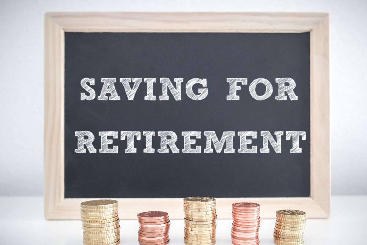 The photo shows a board with save for retirement wording.