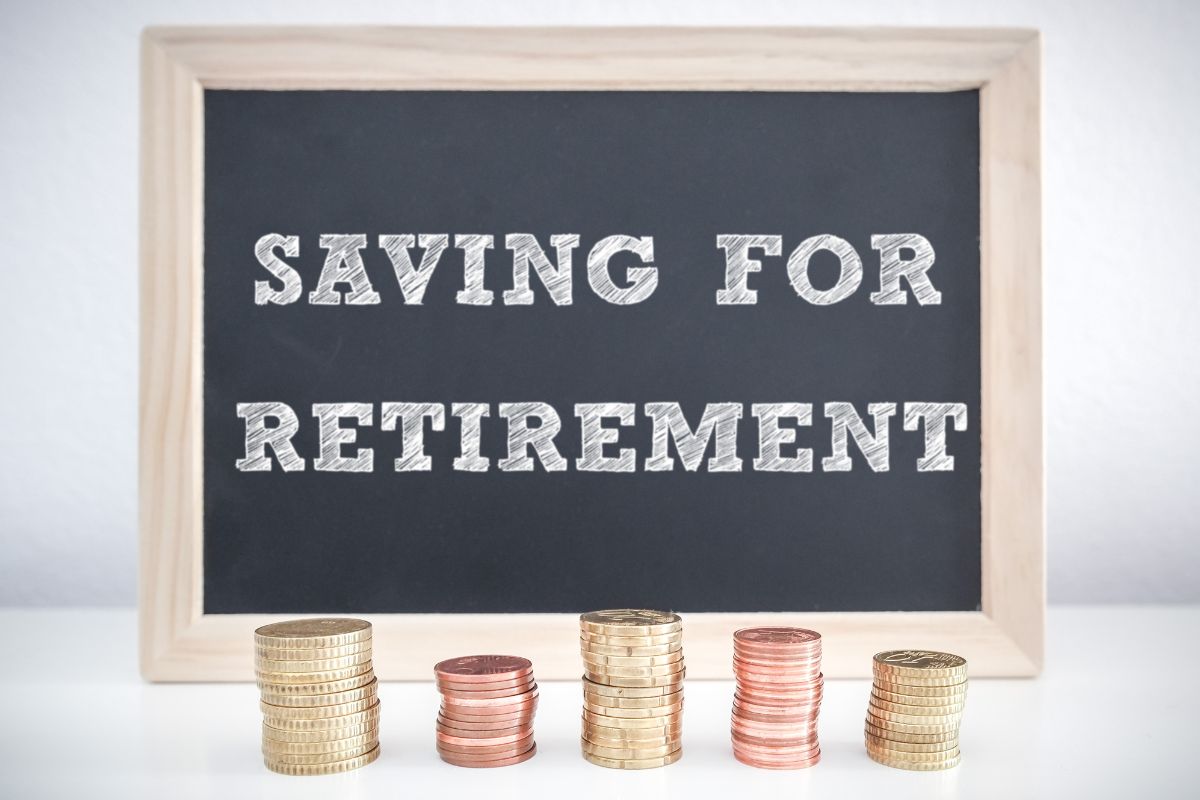 The picture tells about coin stocks and a board with notes which means learn how much to save for retirement helps you plan better and stress less.