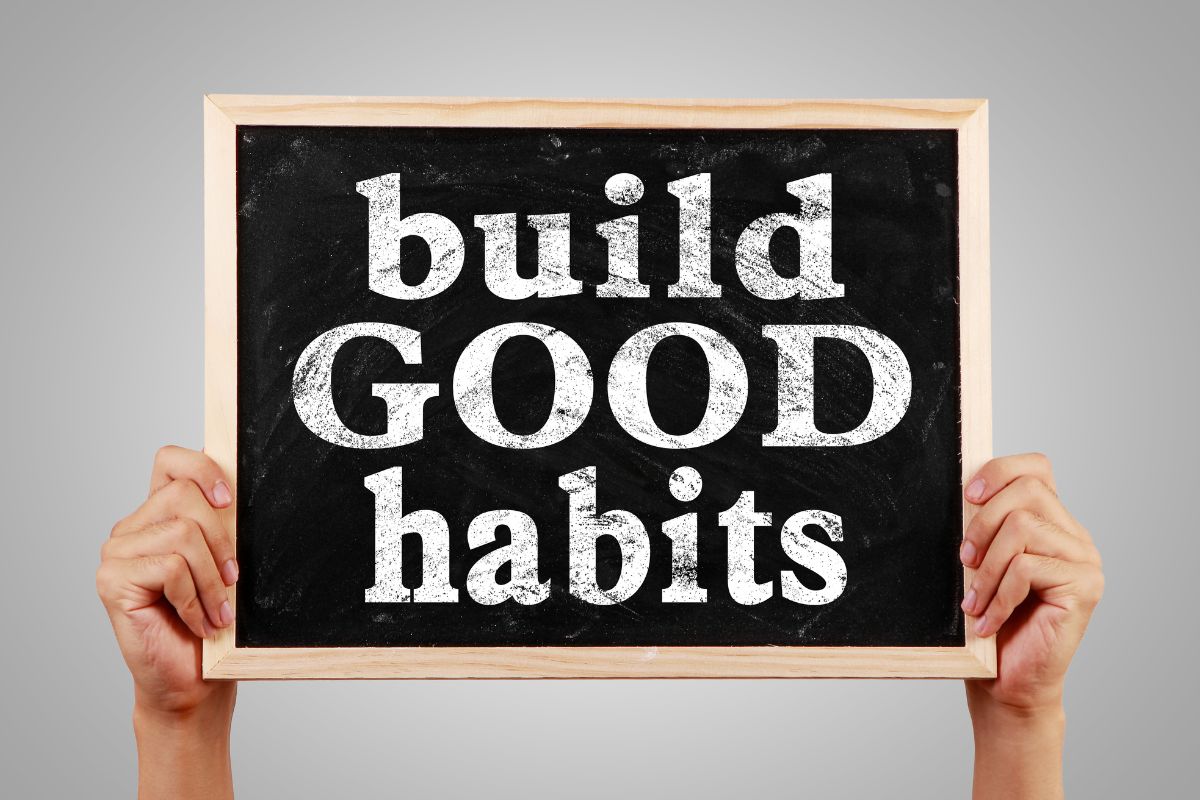 The image is about a board with notes on building good habits.