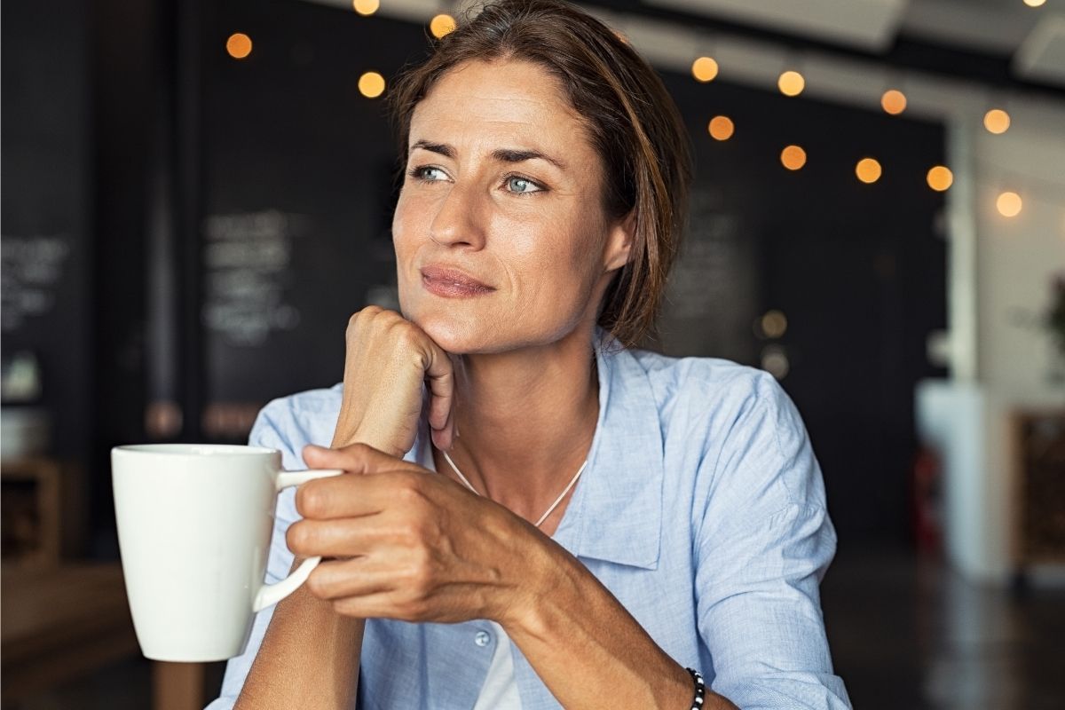 The photo shows a woman imagining debt.