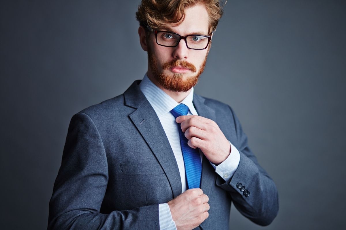 The picture shows a man dressing in a bit sharper.