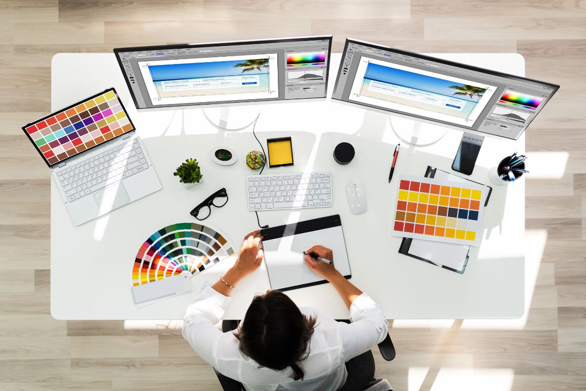 The image is about a woman working as a graphic designer.