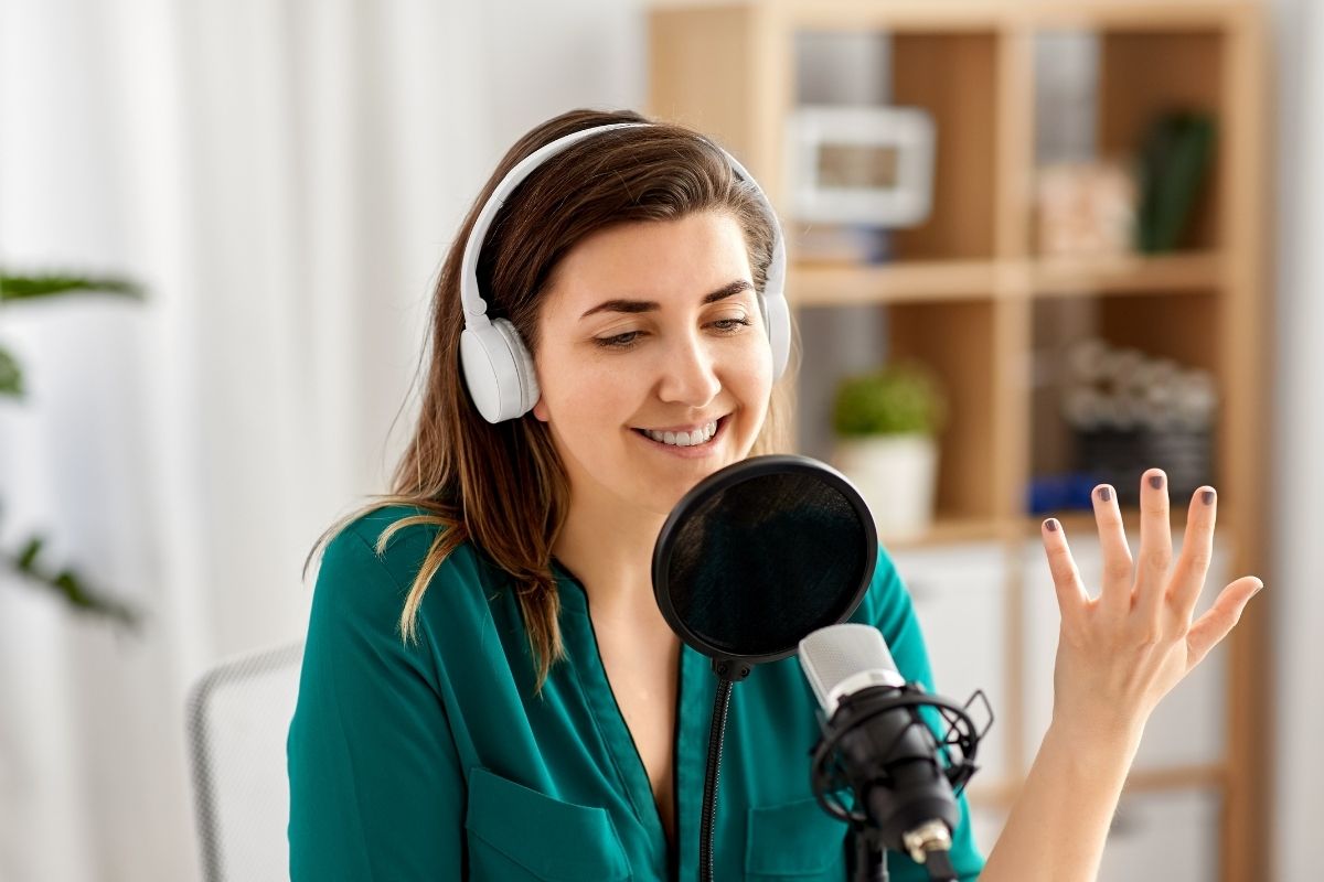 The picture is about a woman working as a podcaster.