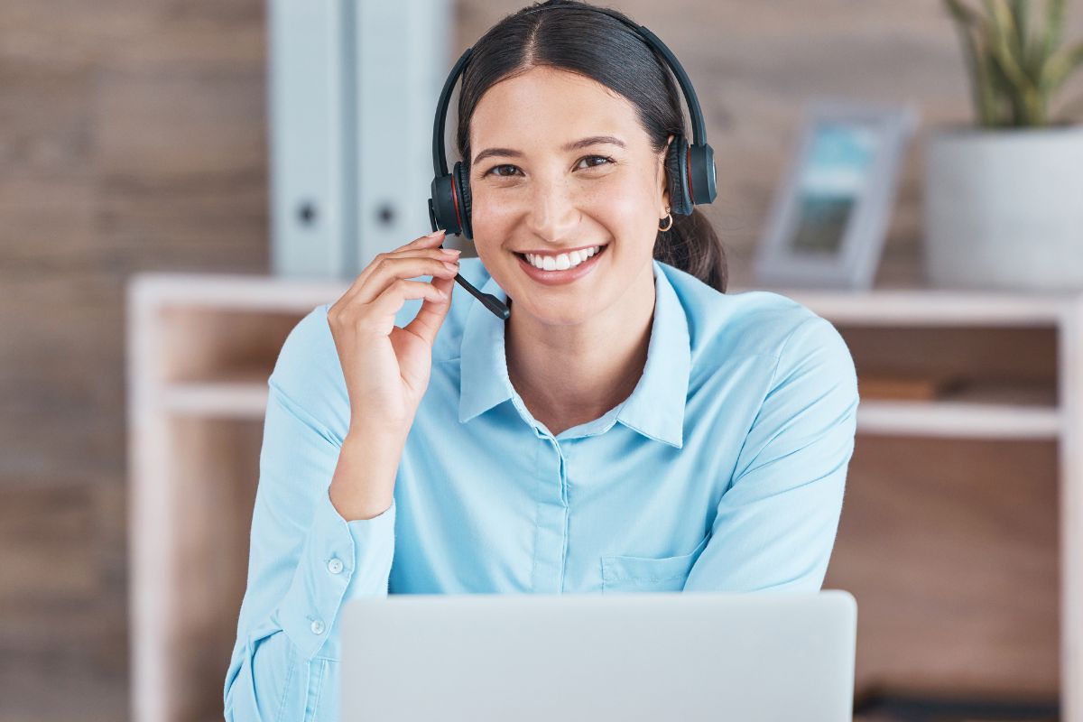 The picture is about a woman working as a remote sales representative.