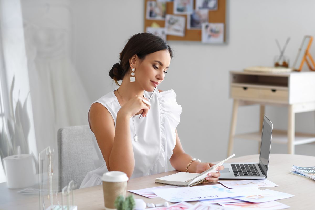 The photo is about a lady working as a virtual event planner.
