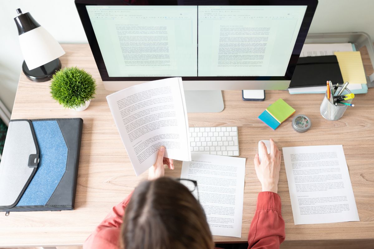 The photo shows a woman working as a translator.
