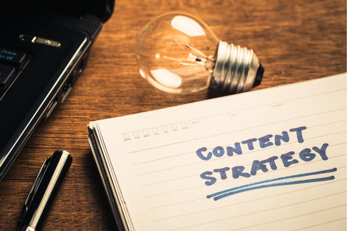 The picture shows a notebook with content strategies wording.