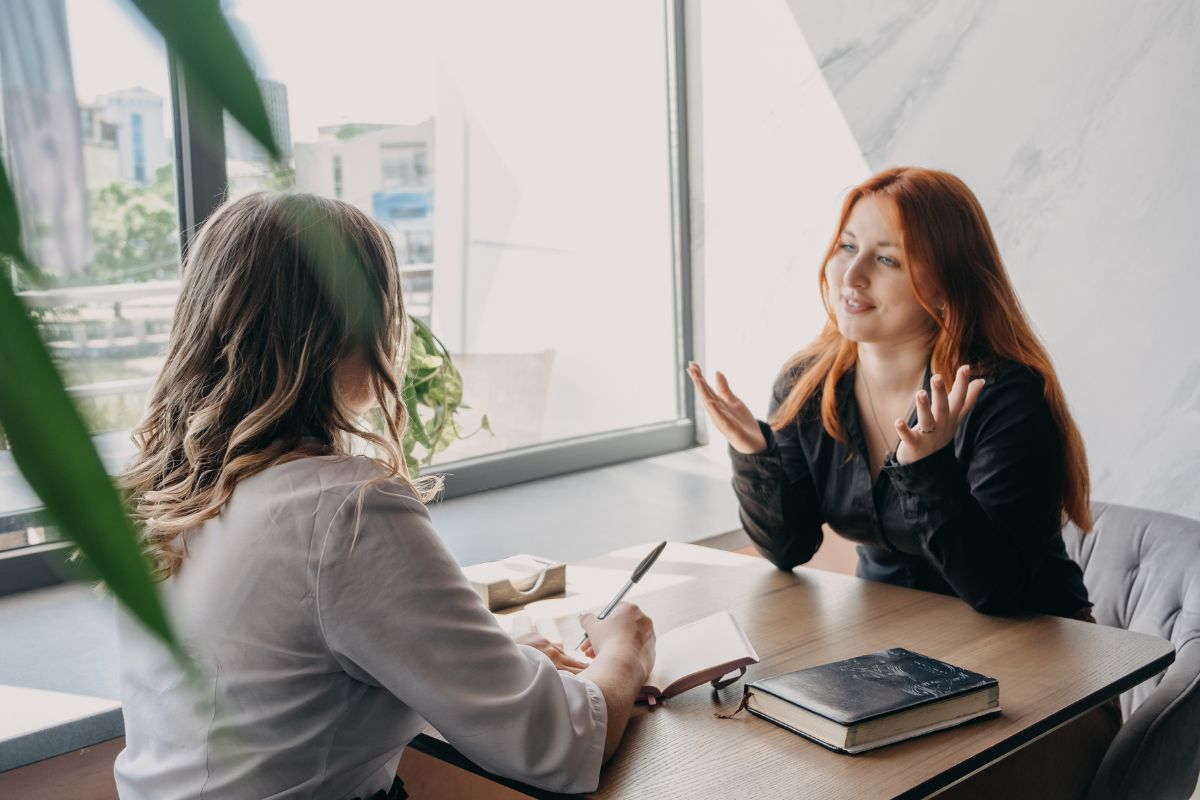 The image is about women talking about sales.