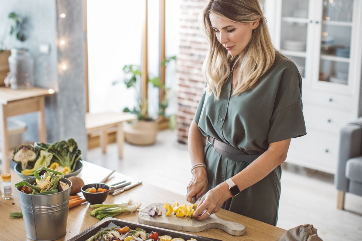 The picture of a woman prepping their meal on Sunday.