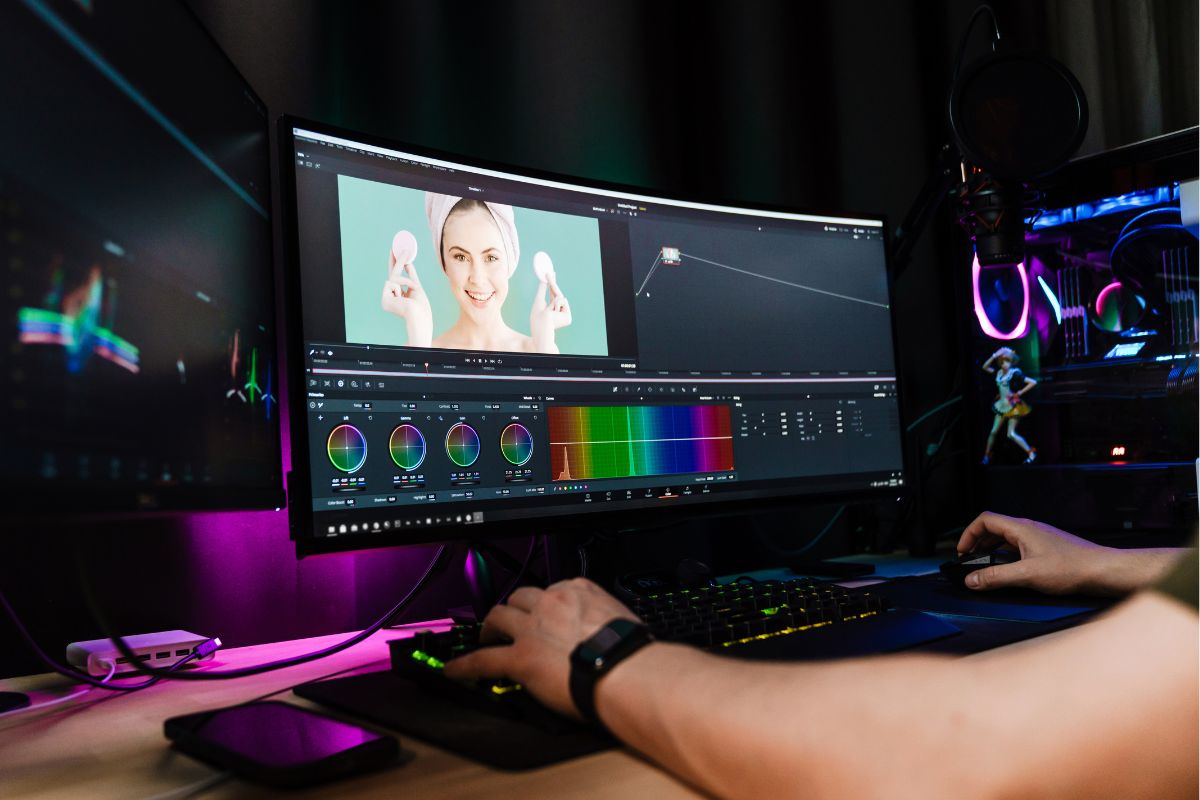 The photo is about a man working as a video editor.