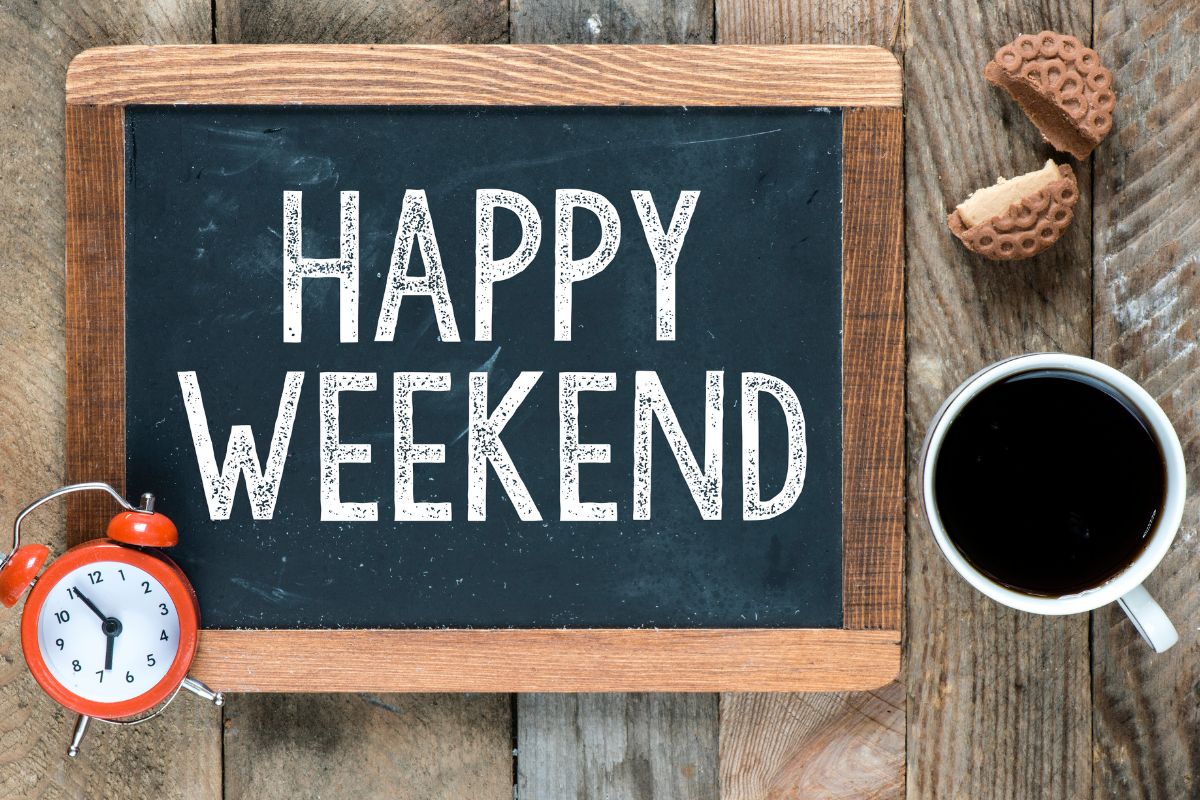 The image shows a board with happy weekend wording.
