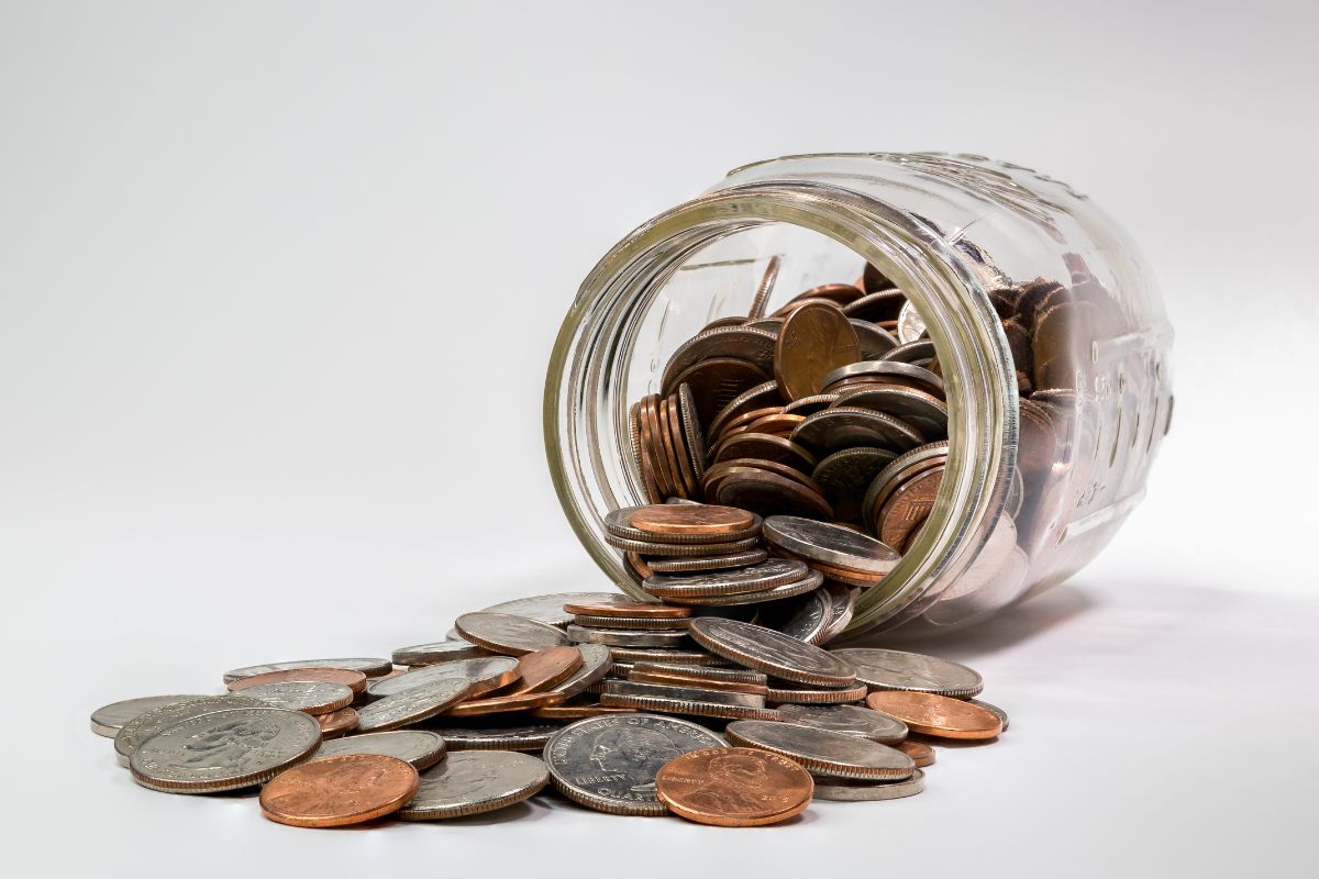The picture is about the spare change jar challenge.