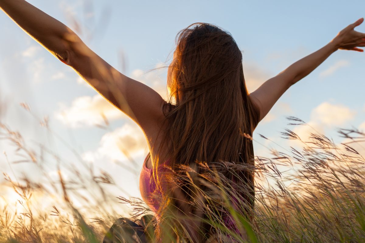 The photo shows a woman with freedom.