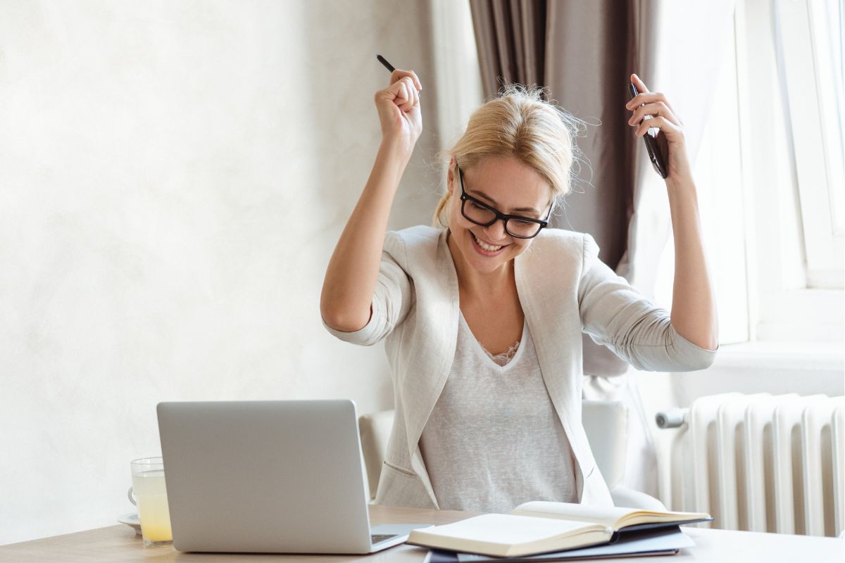 The photo shows a woman celebrating her wins.