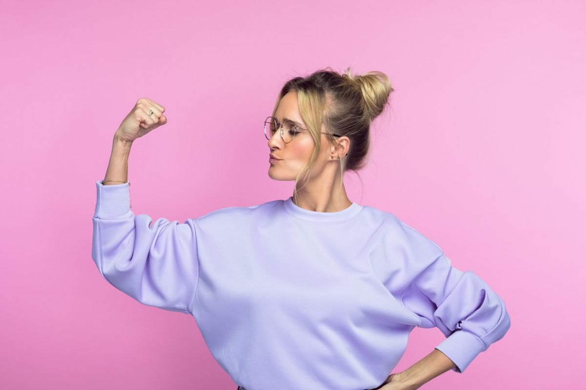 The image is about a woman with confidence.