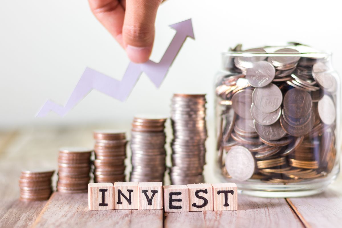 The picture shows coins for investing consistently.