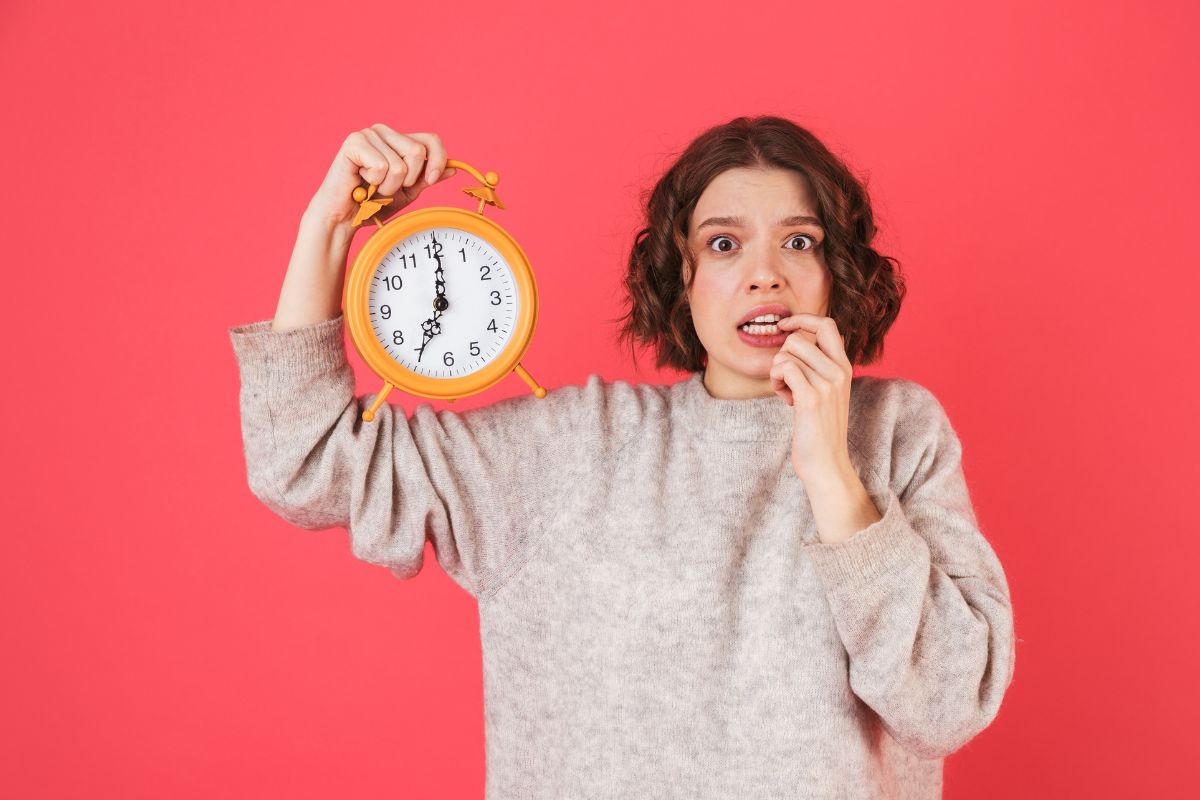 The image shows a lady racing the clock.
