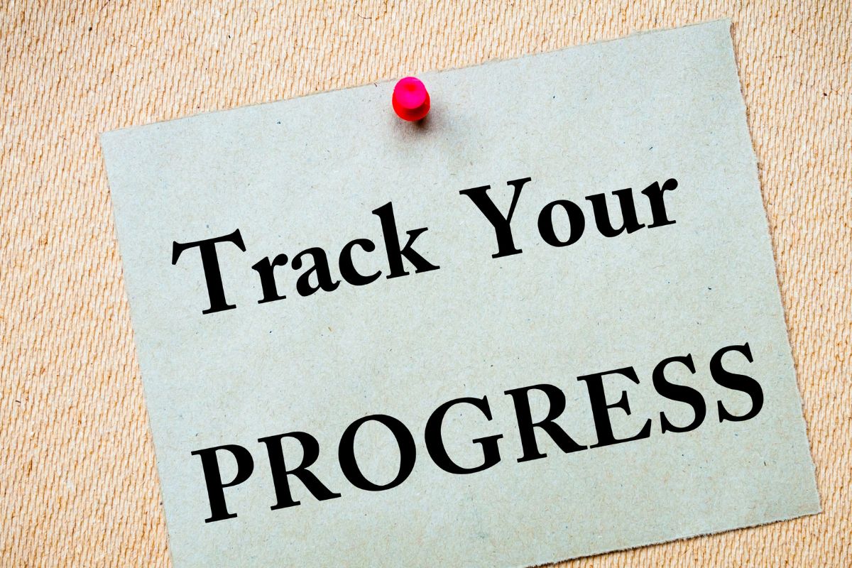The photo shows a paper with the Track your progress wording.