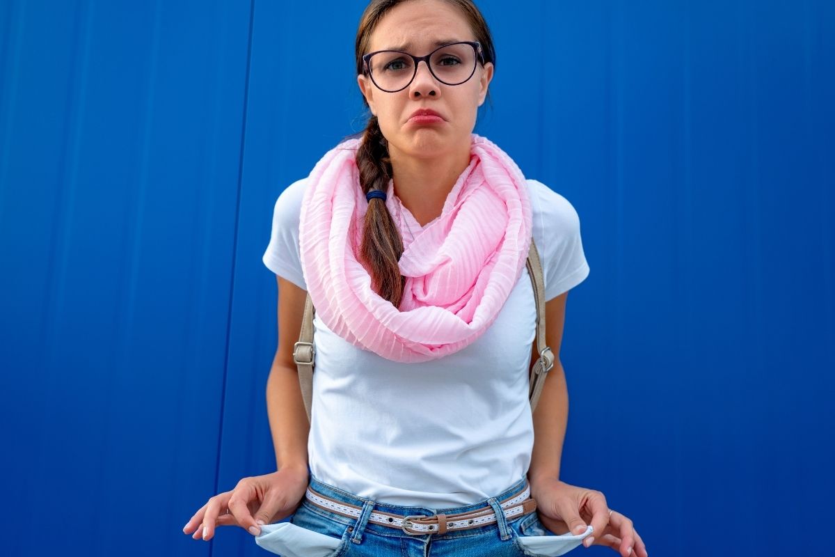 The photo shows a woman saying broke all the time.