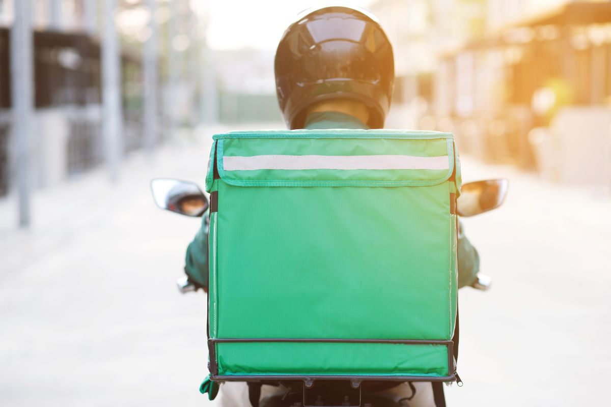 The picture shows a deliveryman.
