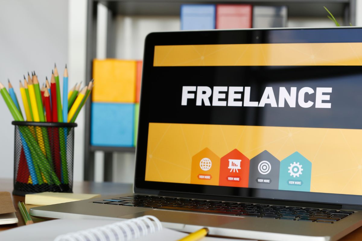 The photo shows a laptop with a freelance screen display.