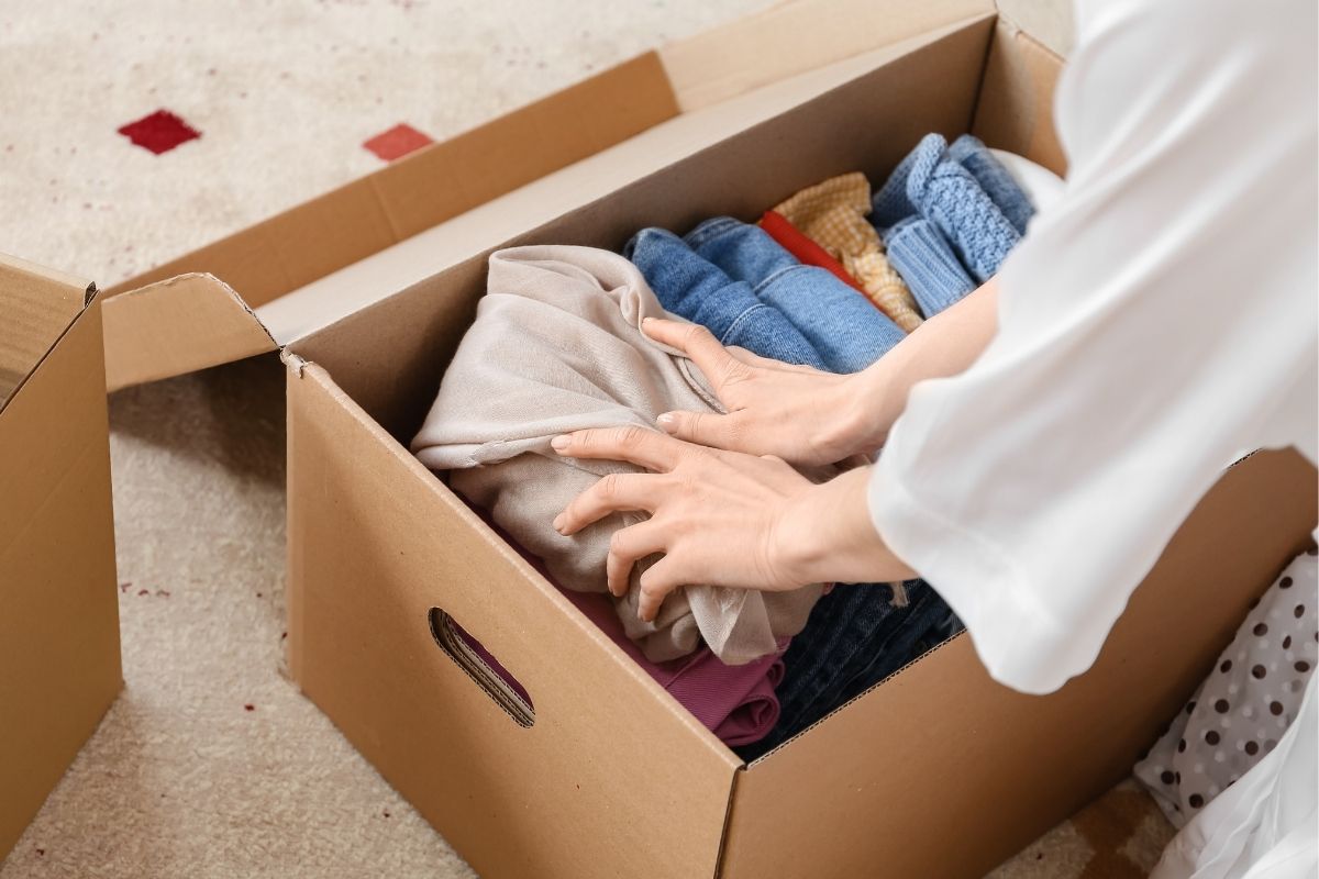 The image shows a lady helping people organize their homes.
