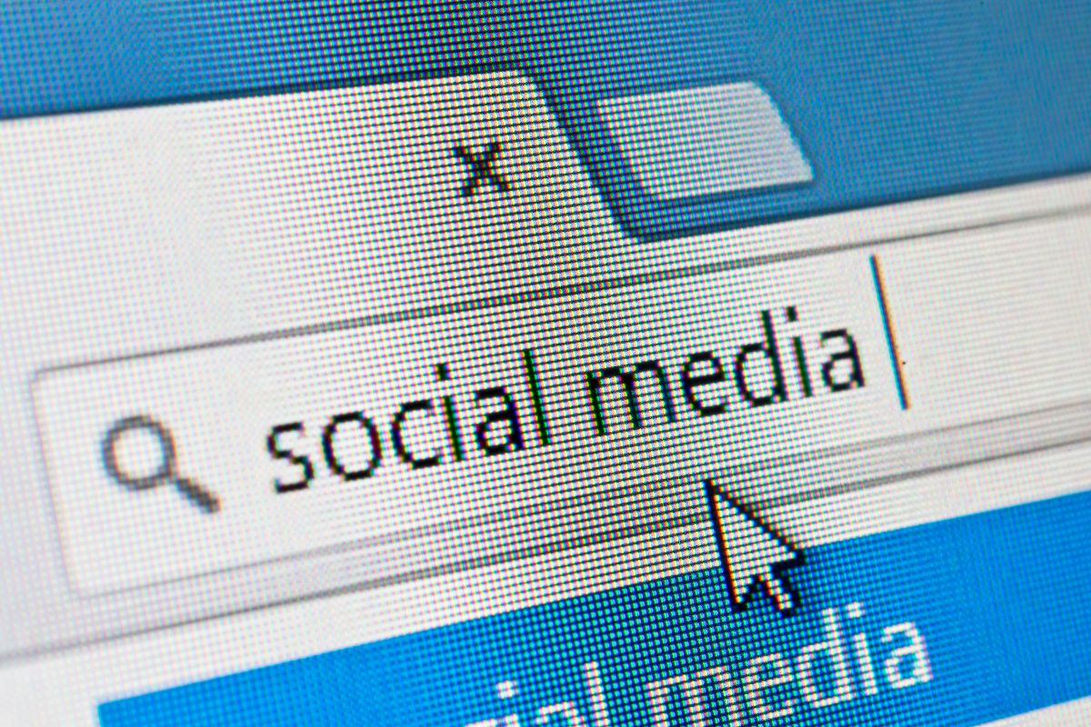 The photo of a screen display with social media wording.