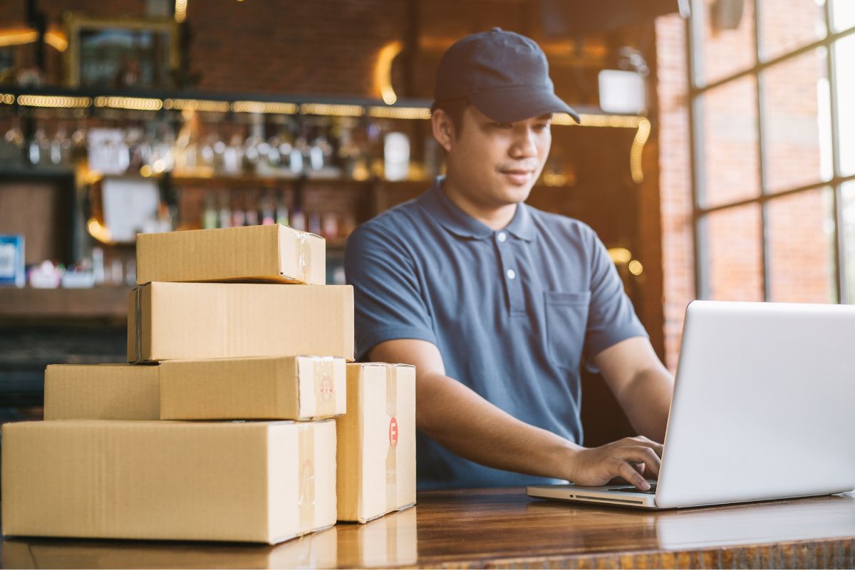An image of a man, dropshipping his products.