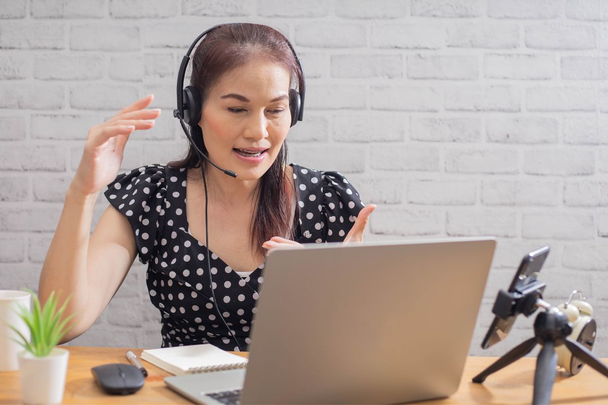 An online tutor working with other people.