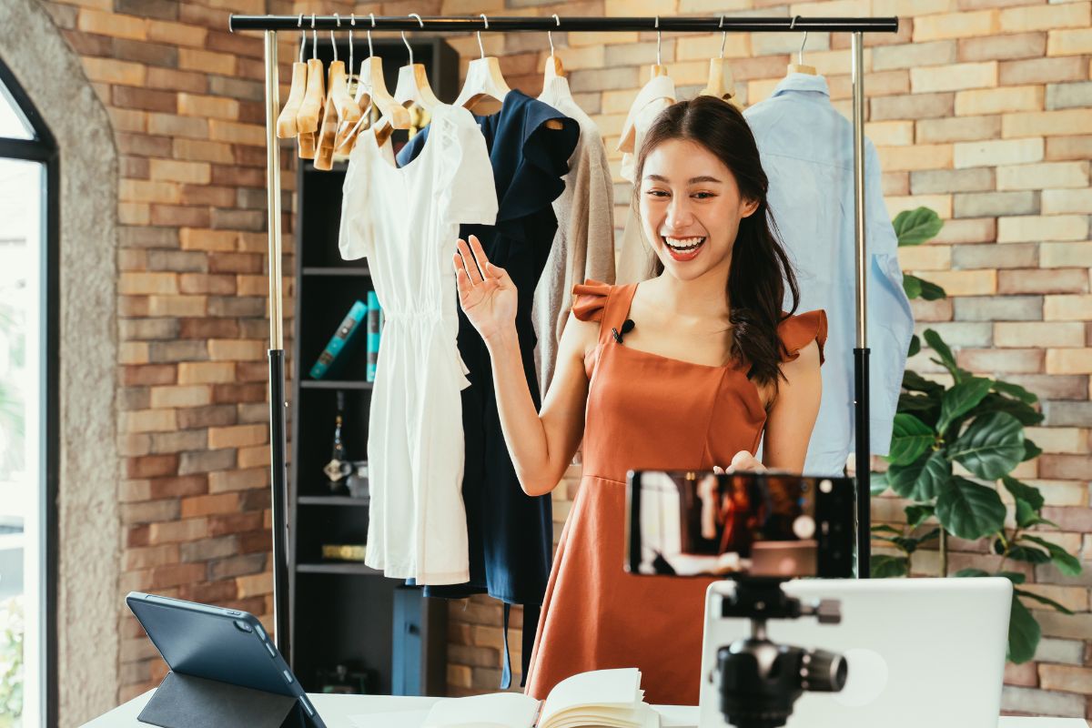 A lady selling clothes online.