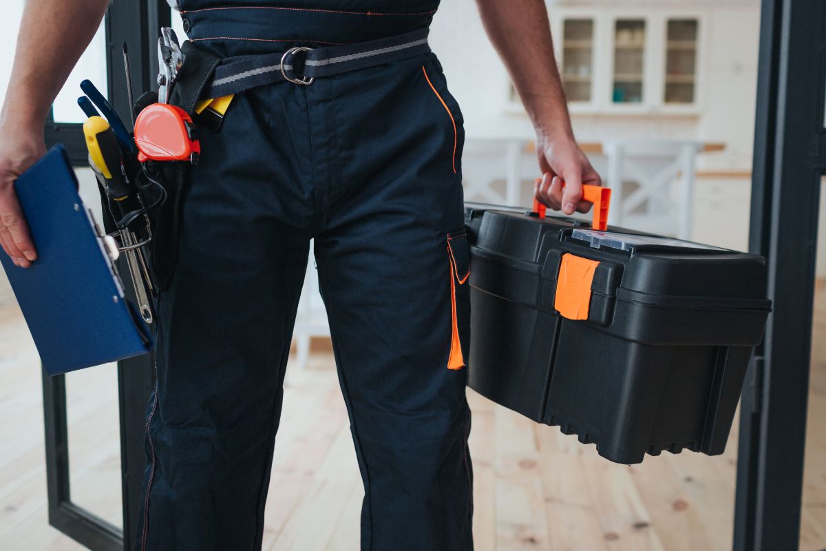 A picture of a man doing handyman services.